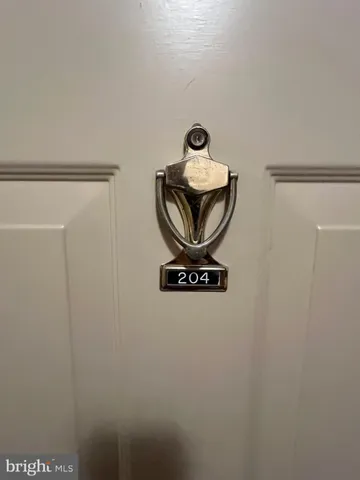 a view of empty room with front door