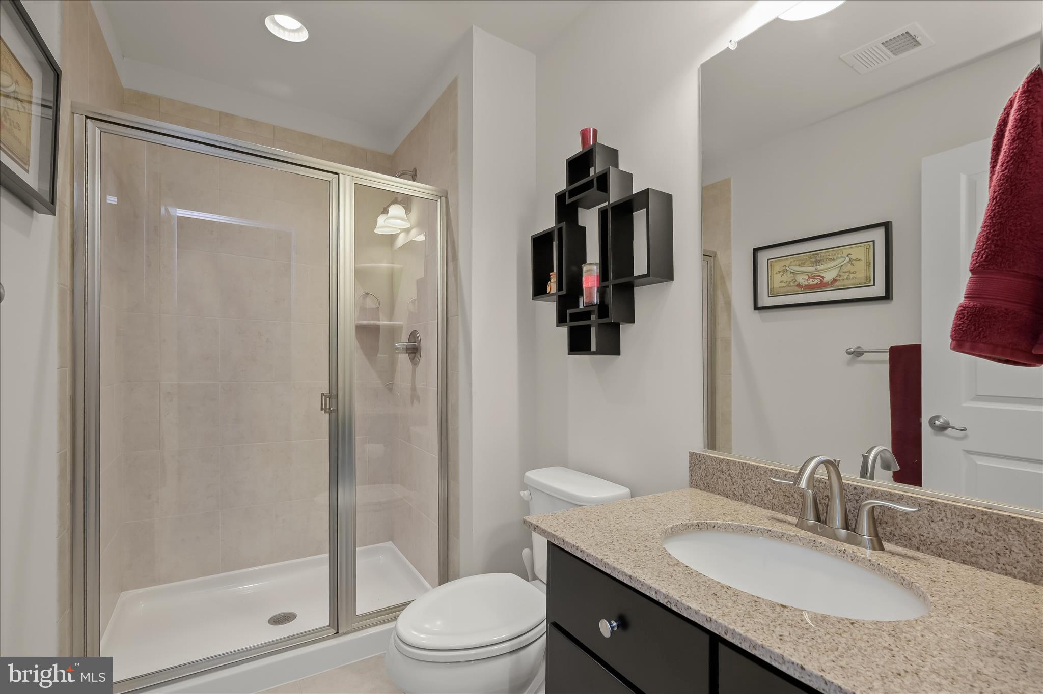 11285 Terrace Lane Fulton, MD 20759 - Photo 42 of 52 a bathroom with a granite countertop sink toilet and shower