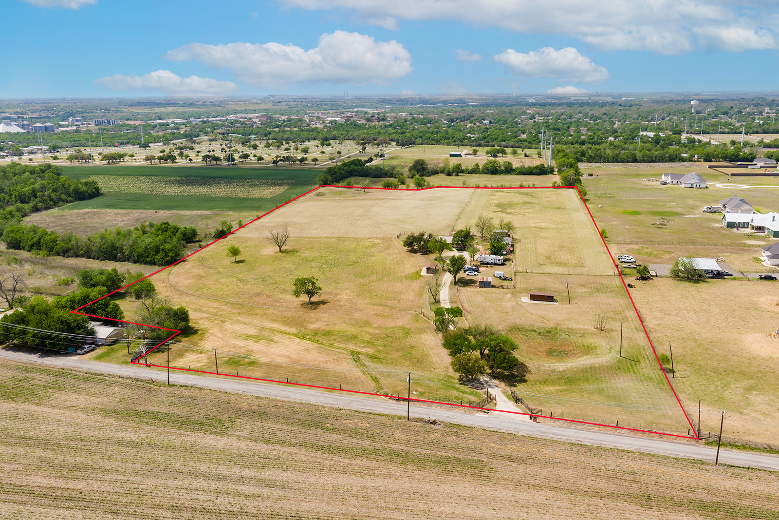 1001 Gravel Pit Road Taylor, TX 76574 - Photo 2 of 38 Aerial view of sparsely populated area with property boundaries highlighted and farmland