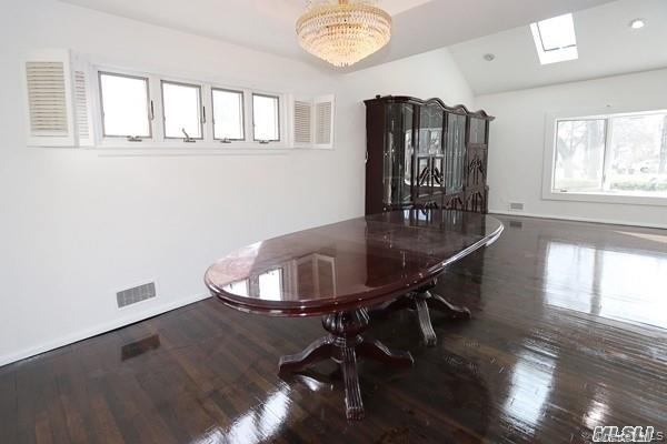 5 Gilbert Road Great Neck, NY 11024 - Photo 5 of 20 a dining room with furniture and window