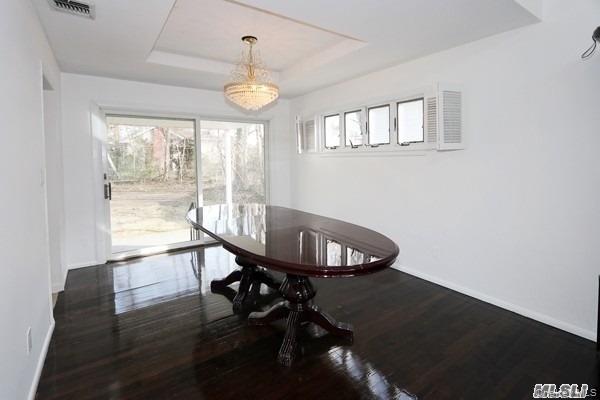 5 Gilbert Road Great Neck, NY 11024 - Photo 6 of 20 a view of a dining room with furniture window and outside view