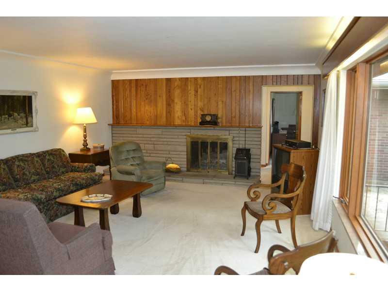 8270 Fox Ridge Road Pittsburgh, PA 15237 - Photo 6 of 25 Living Room. Hardwood under carpeting.