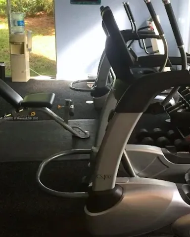 a view of swimming pool from a living room