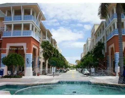 a view of a building with a yard