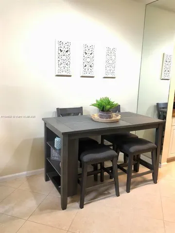 a view of a workspace with furniture