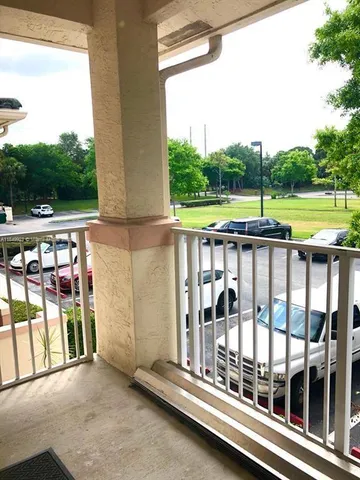 a balcony view with a outdoor space