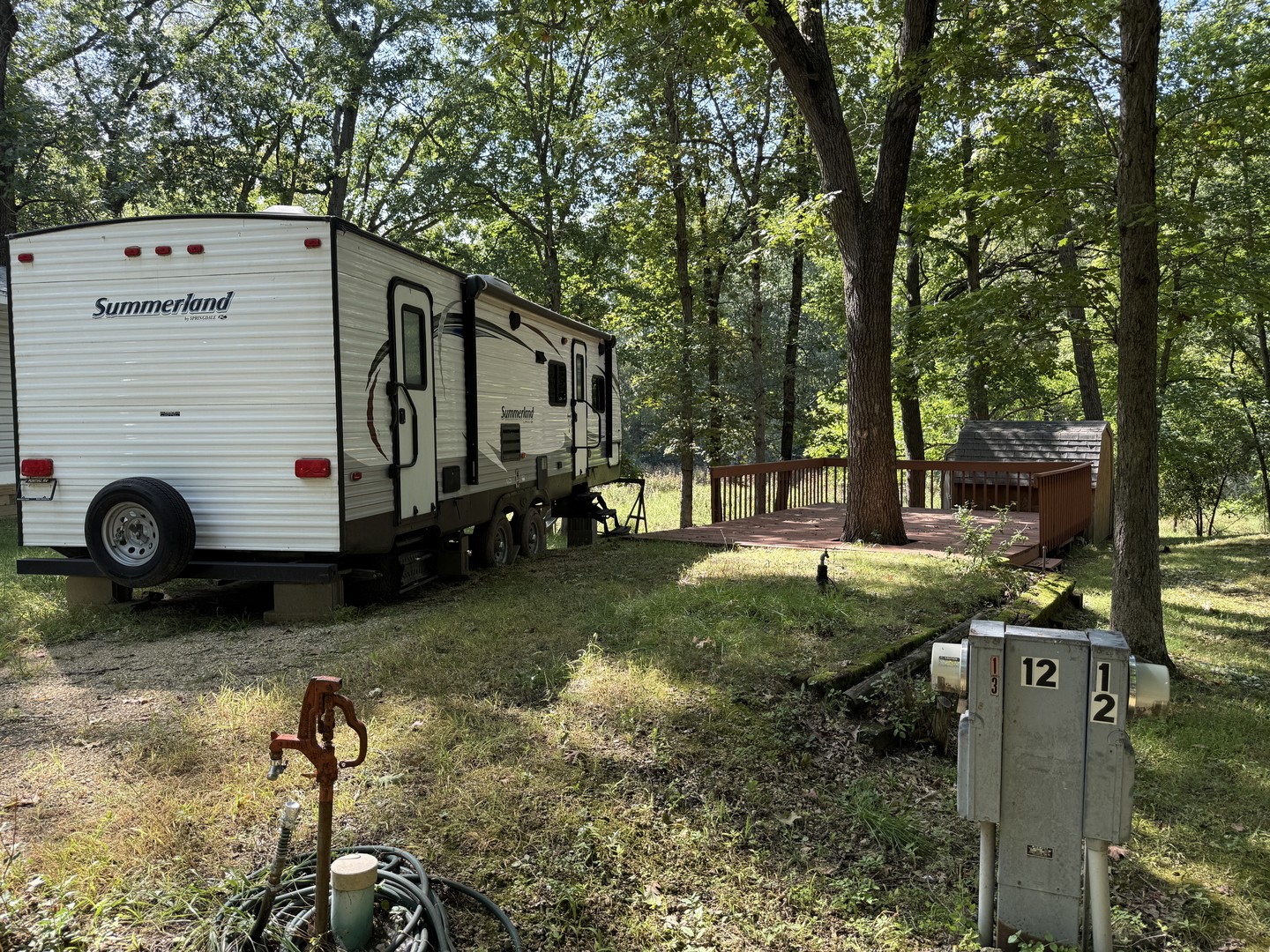 12-13 Woodhaven Lakes Sublette, IL 61367 - Photo 1 of 26 a view of a house with backyard