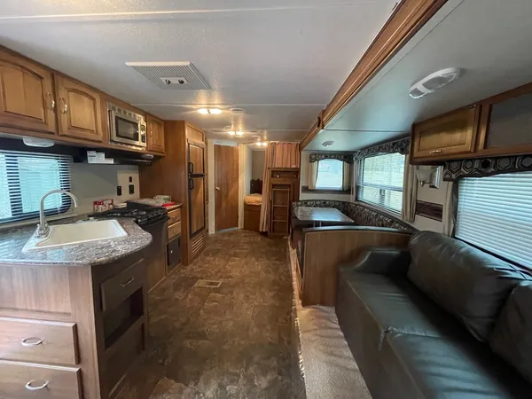 a kitchen with granite countertop lots of counter top space