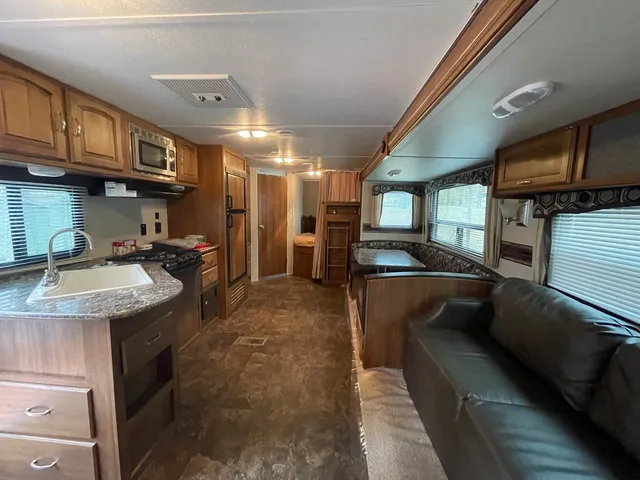 a kitchen with granite countertop lots of counter top space