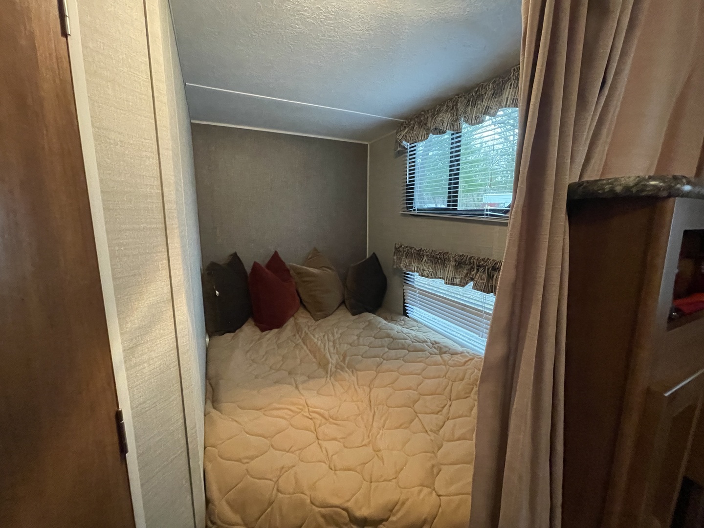 12-13 Woodhaven Lakes Sublette, IL 61367 - Photo 19 of 26 a bed room with a bed and a window