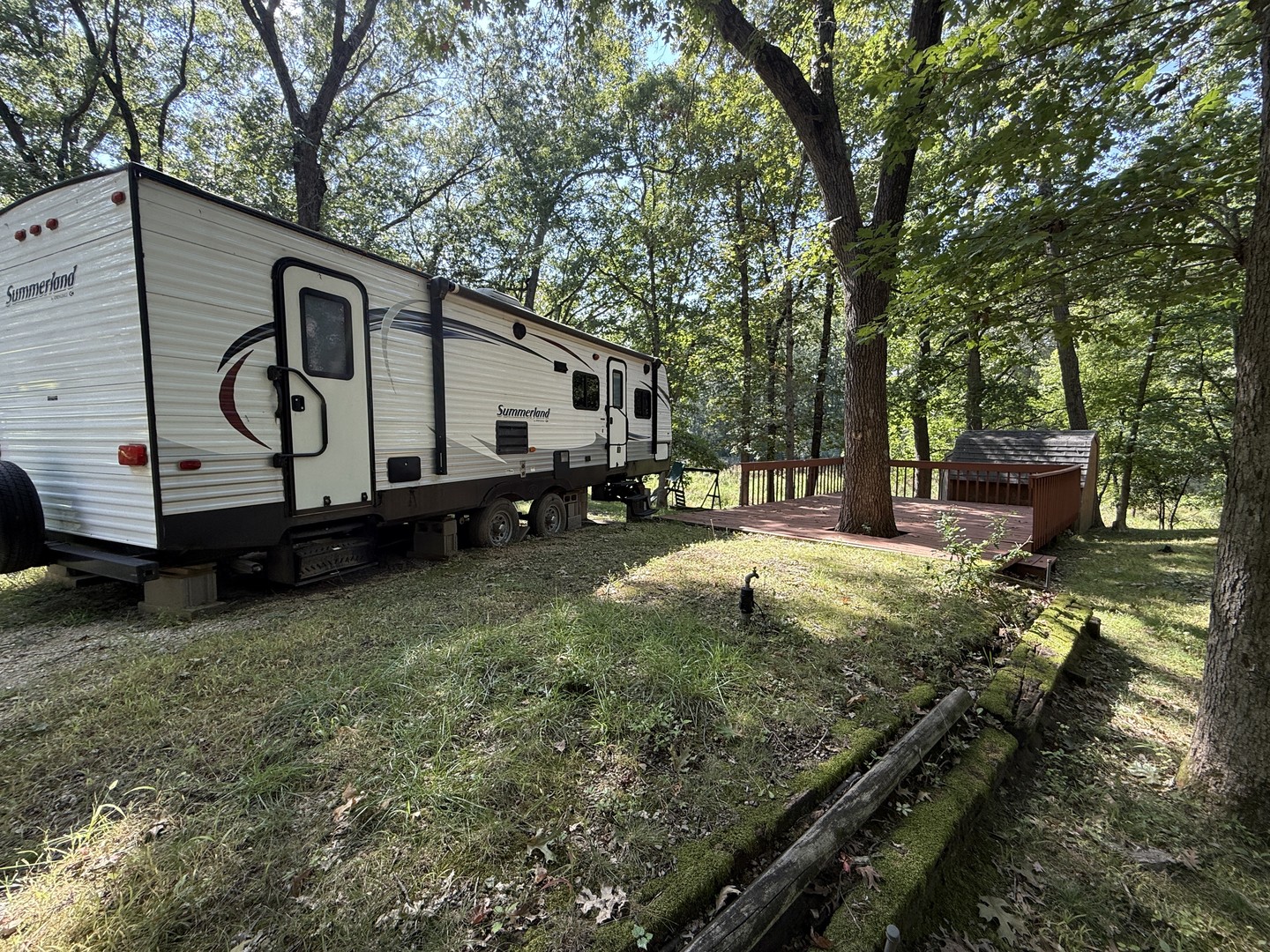 12-13 Woodhaven Lakes Sublette, IL 61367 - Photo 2 of 26 a backyard of a house with barbeque oven table and chairs