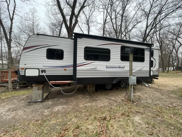 a view of a car park in front of the house
