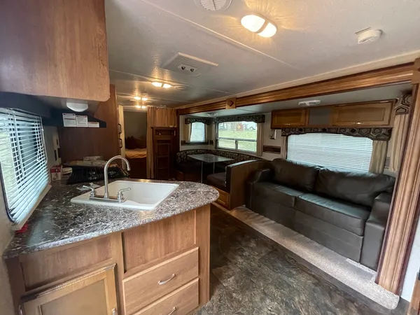 a living room with furniture and a table