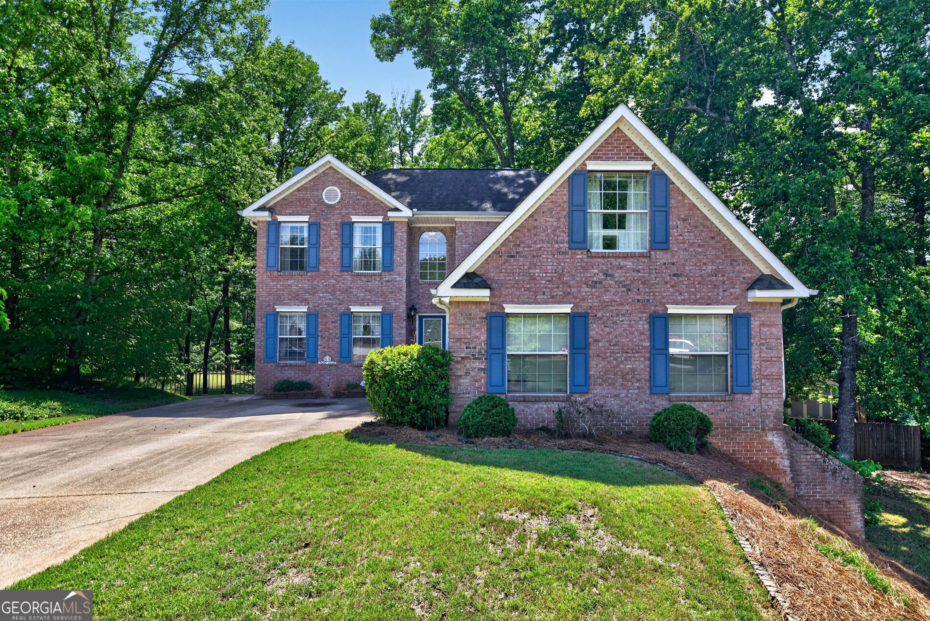 101 Emerald Lane Hampton, GA 30228 - Photo 1 of 72 a front view of a house with a yard and garage