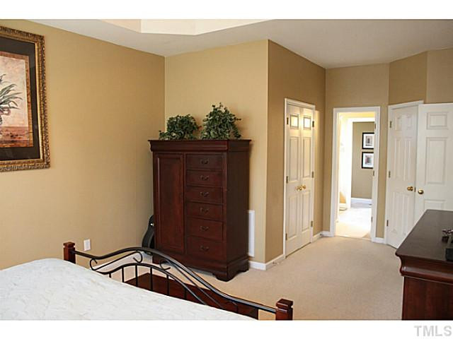 1905 Patterson Grove Road Apex, NC 27502 - Photo 13 of 25 Walk in closet and bath access shown in this photo along with the extra long room space