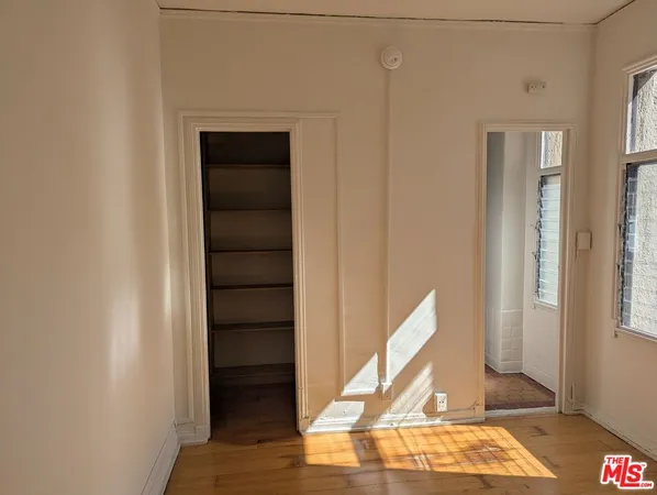 a bathroom with a sink and cabinets