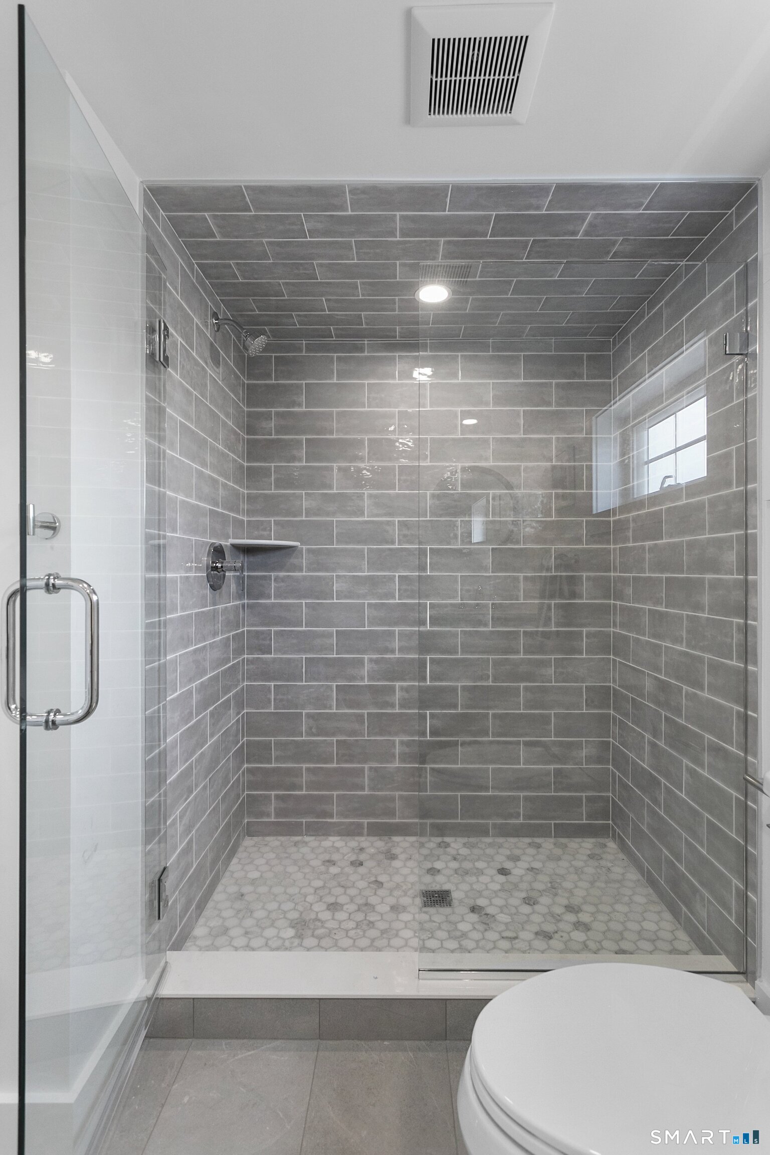 12 Sandy Way Fairfield, CT 06824 - Photo 24 of 33 a bathroom with a shower and toilet