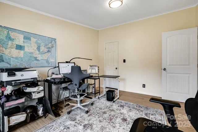 a view of a backyard with large trees