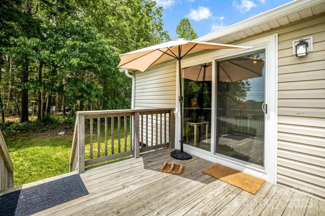 a table and chairs in a garden