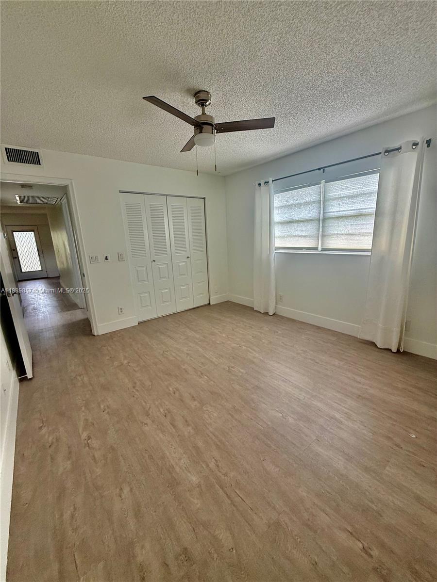 150 Southwest 134th Way, Unit 305R Pembroke Pines, FL 33027 - Photo 9 of 19 a view of an empty room with a window