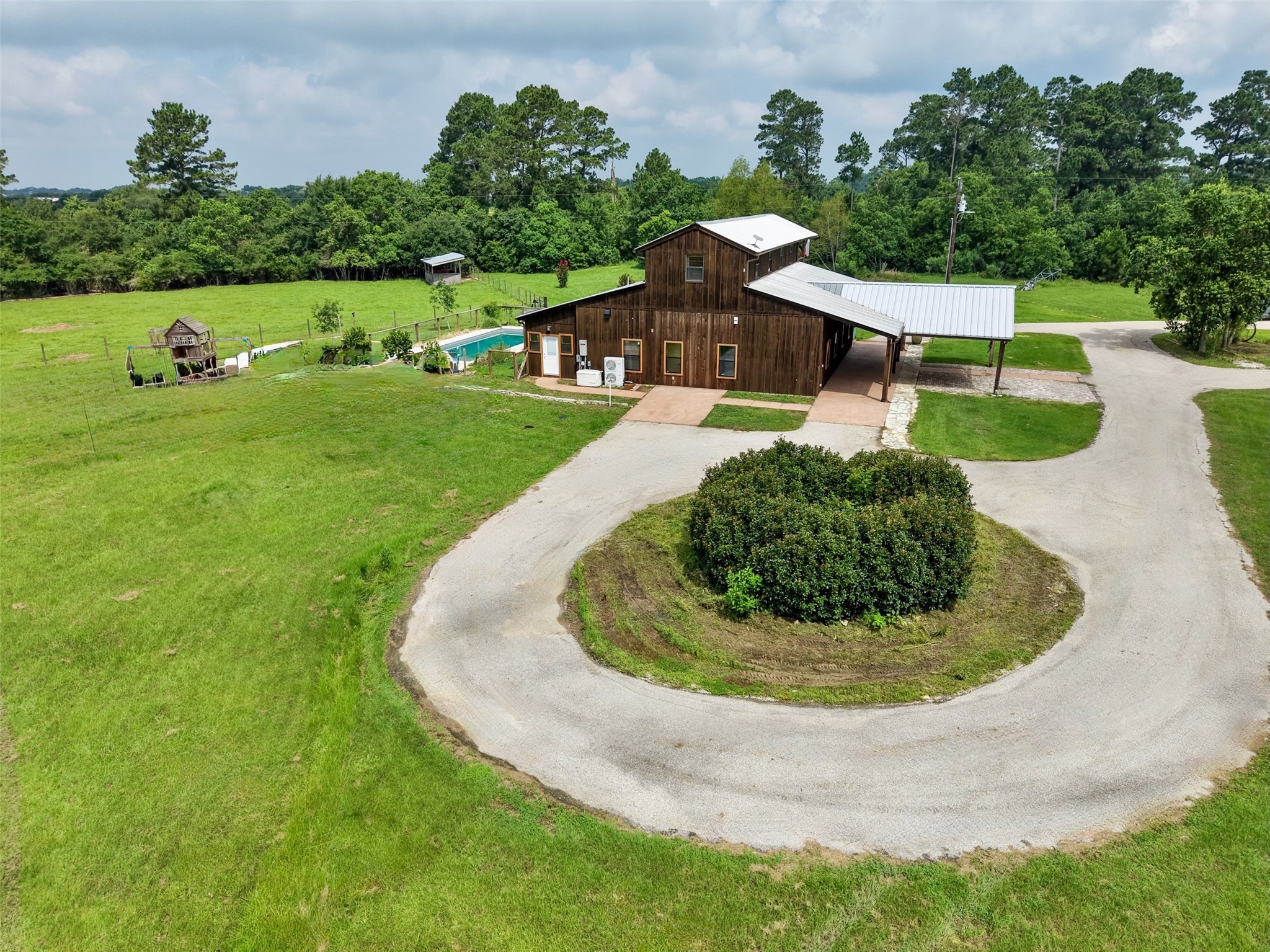 26534 Mitchell Road Hempstead, TX 77445 - Photo 41 of 45 a view of a house with a yard