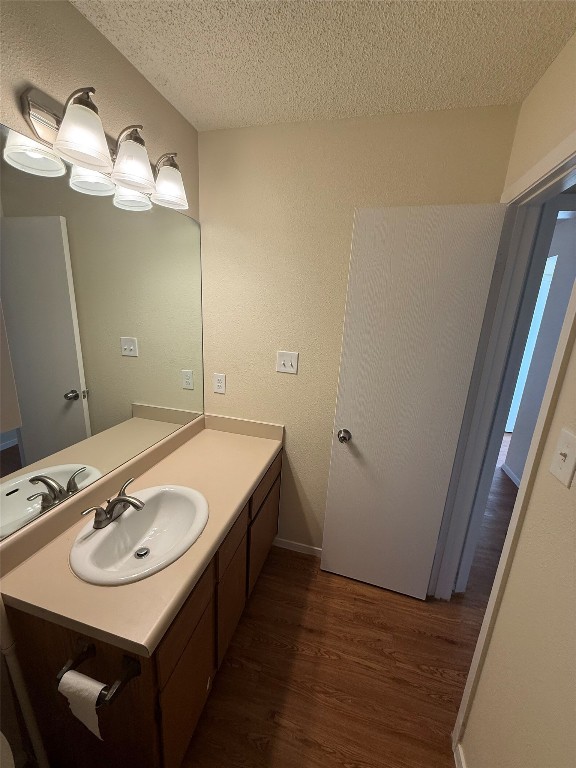 2504 Howellwood Way, Unit B Austin, TX 78748 - Photo 15 of 20 a bathroom with a sink and a mirror