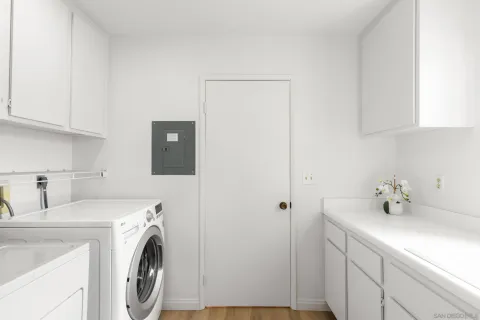 a utility room with dryer and washer