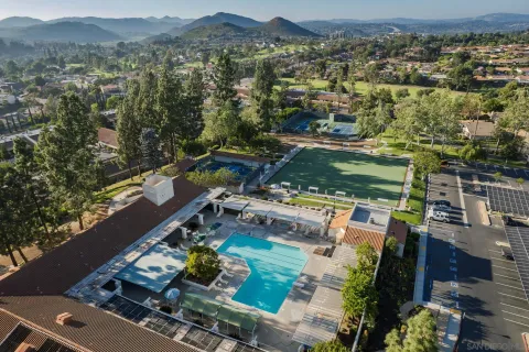 an aerial view of a house with a garden