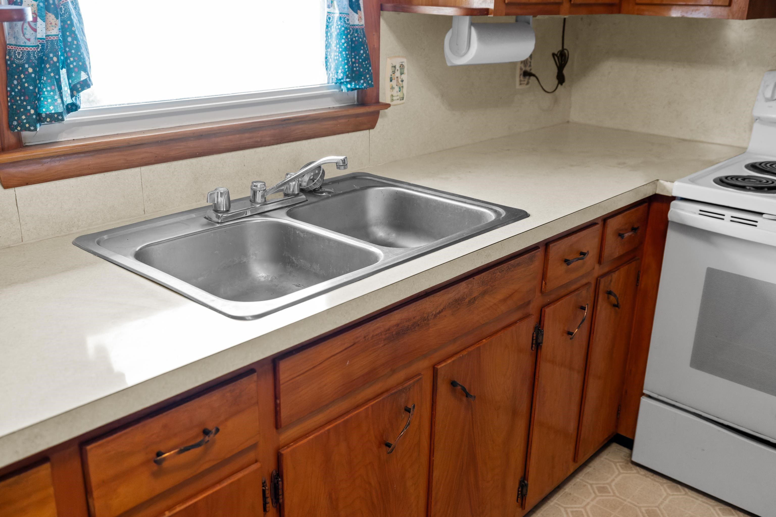 3493 Zion Church Road Broadway, VA 22815 - Photo 14 of 74 a close view of sink and tap