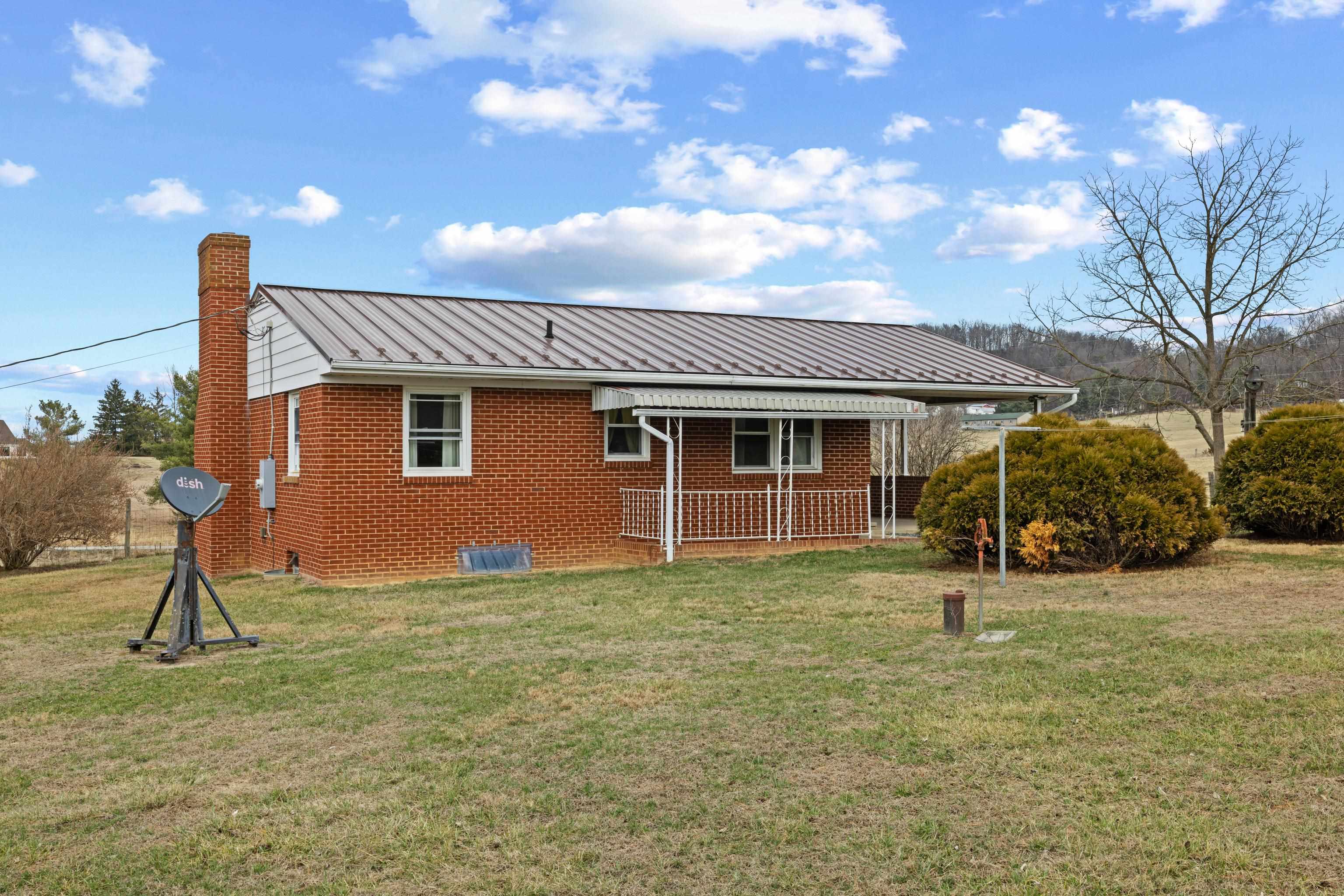 3493 Zion Church Road Broadway, VA 22815 - Photo 33 of 74 a front view of a house with a yard