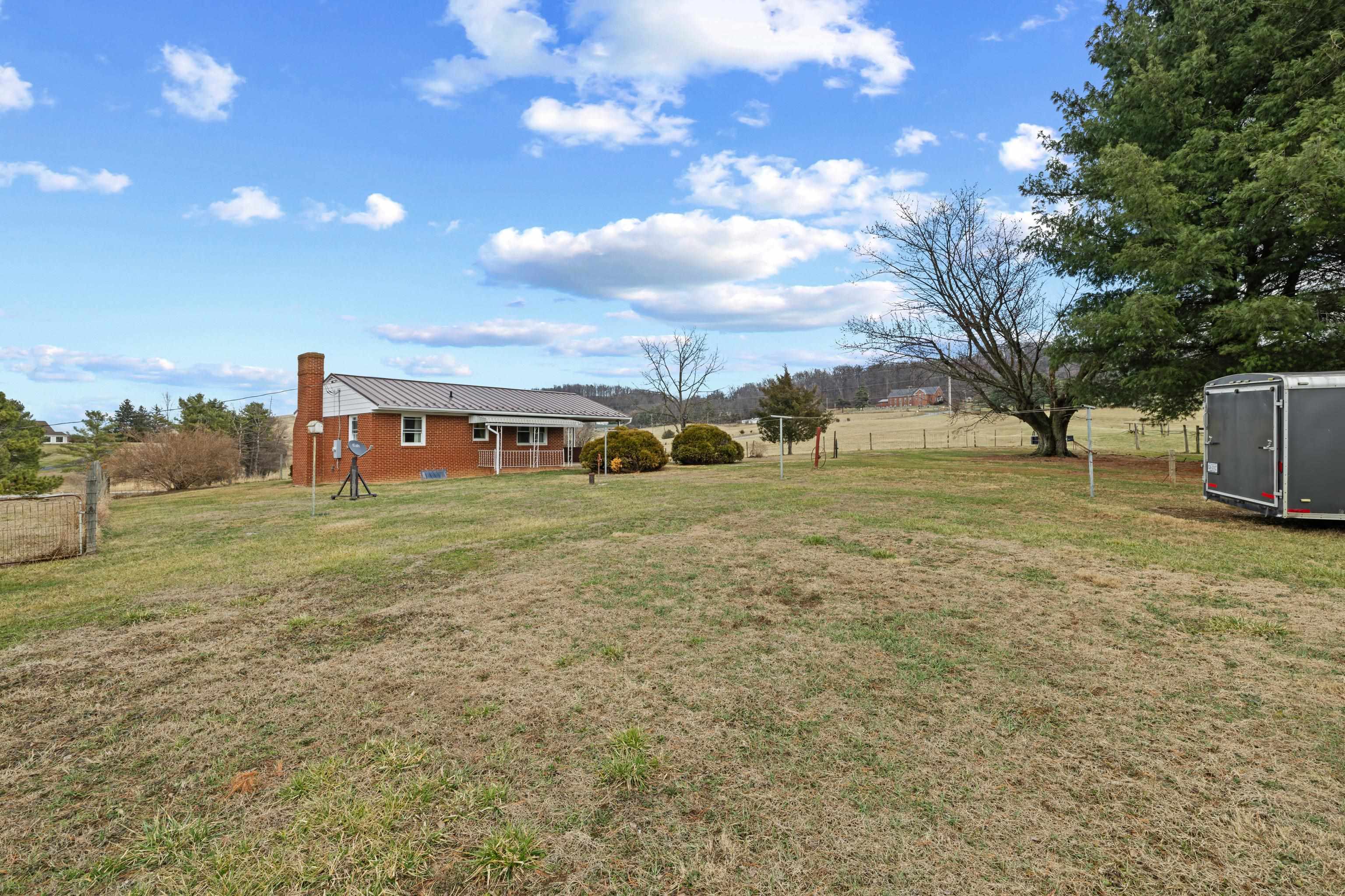 3493 Zion Church Road Broadway, VA 22815 - Photo 34 of 74 a view of a house with a yard