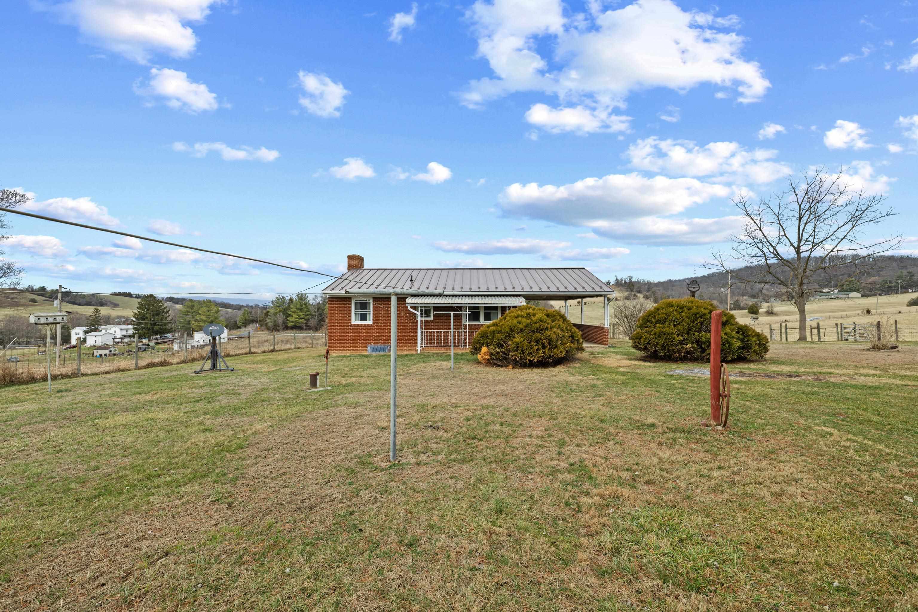 3493 Zion Church Road Broadway, VA 22815 - Photo 35 of 74 a view of a big yard next to a yard