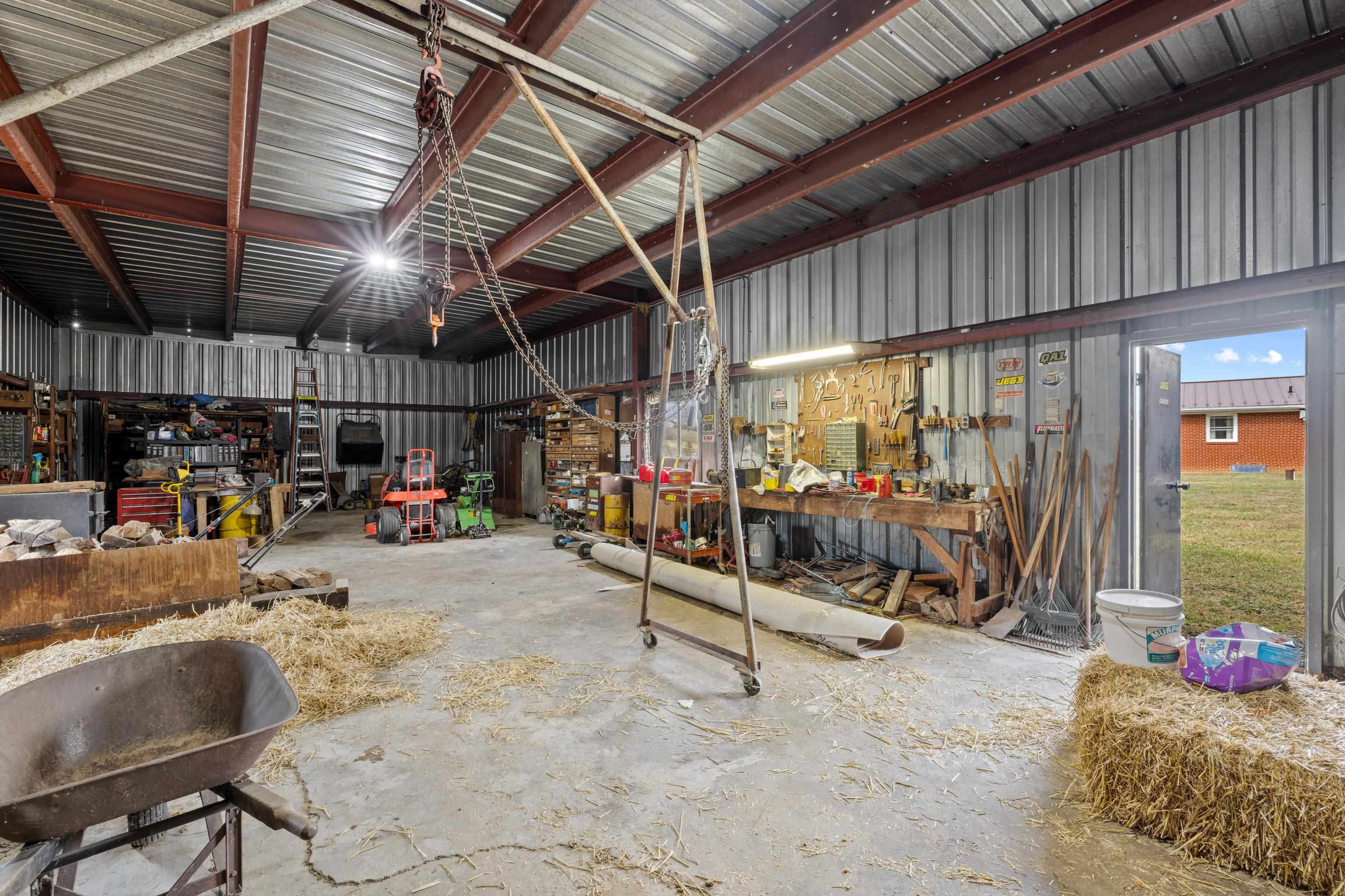 3493 Zion Church Road Broadway, VA 22815 - Photo 41 of 74 a view of a storage room with racks
