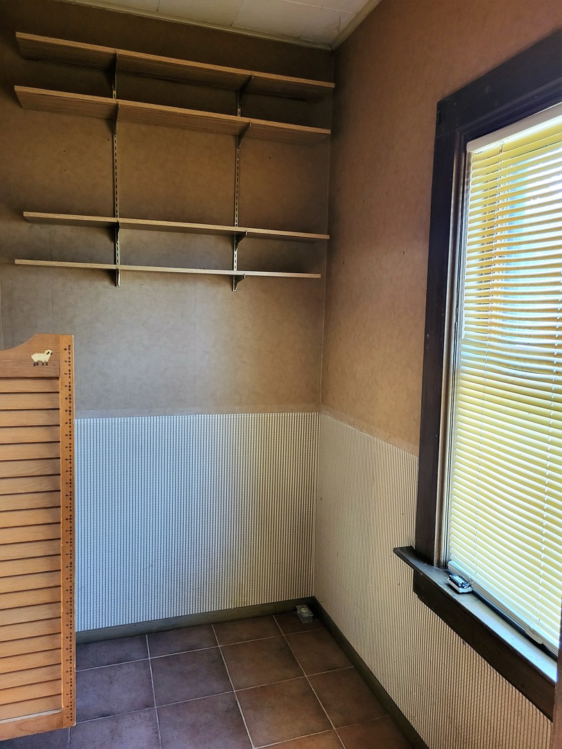 102 South 9th Street Rochelle, IL 61068 - Photo 5 of 13 a view of a small space