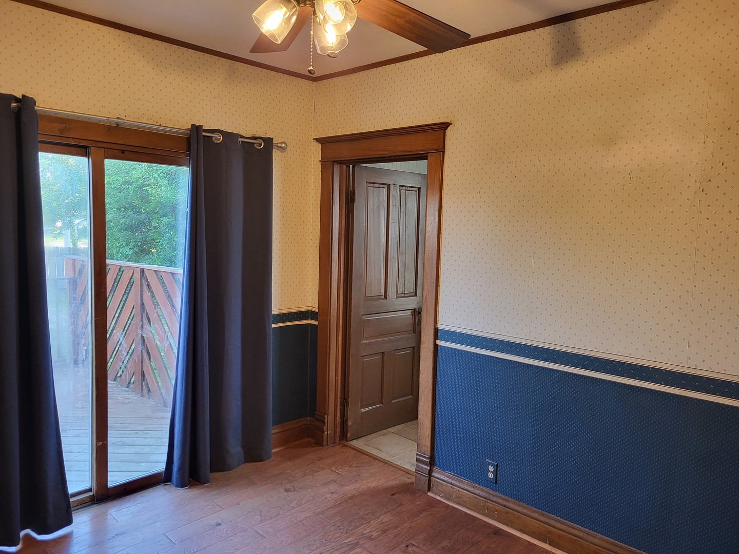 102 South 9th Street Rochelle, IL 61068 - Photo 8 of 13 an empty room with window and hallway