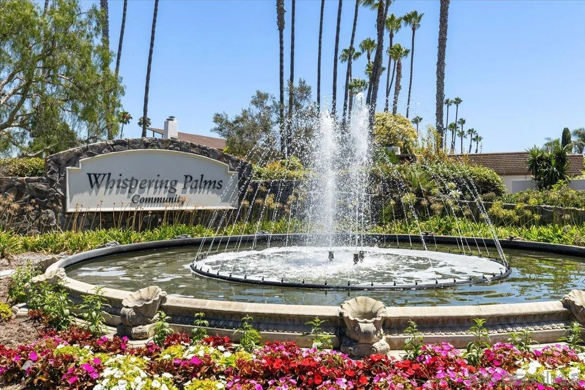 5609 Avenida De Parque Rancho Santa Fe, CA 92091 - Photo 2 of 26 a view of a house with a yard and a fountain