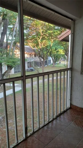 a view of a large window with an outdoor space