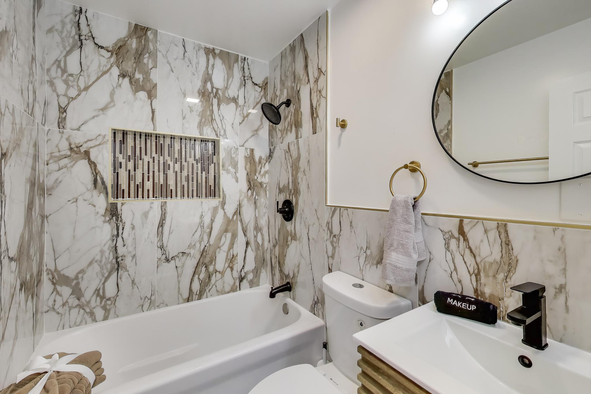 1124 Clinton Street Gary, IN 46406 - Photo 20 of 52 a bathroom with a sink and a mirror