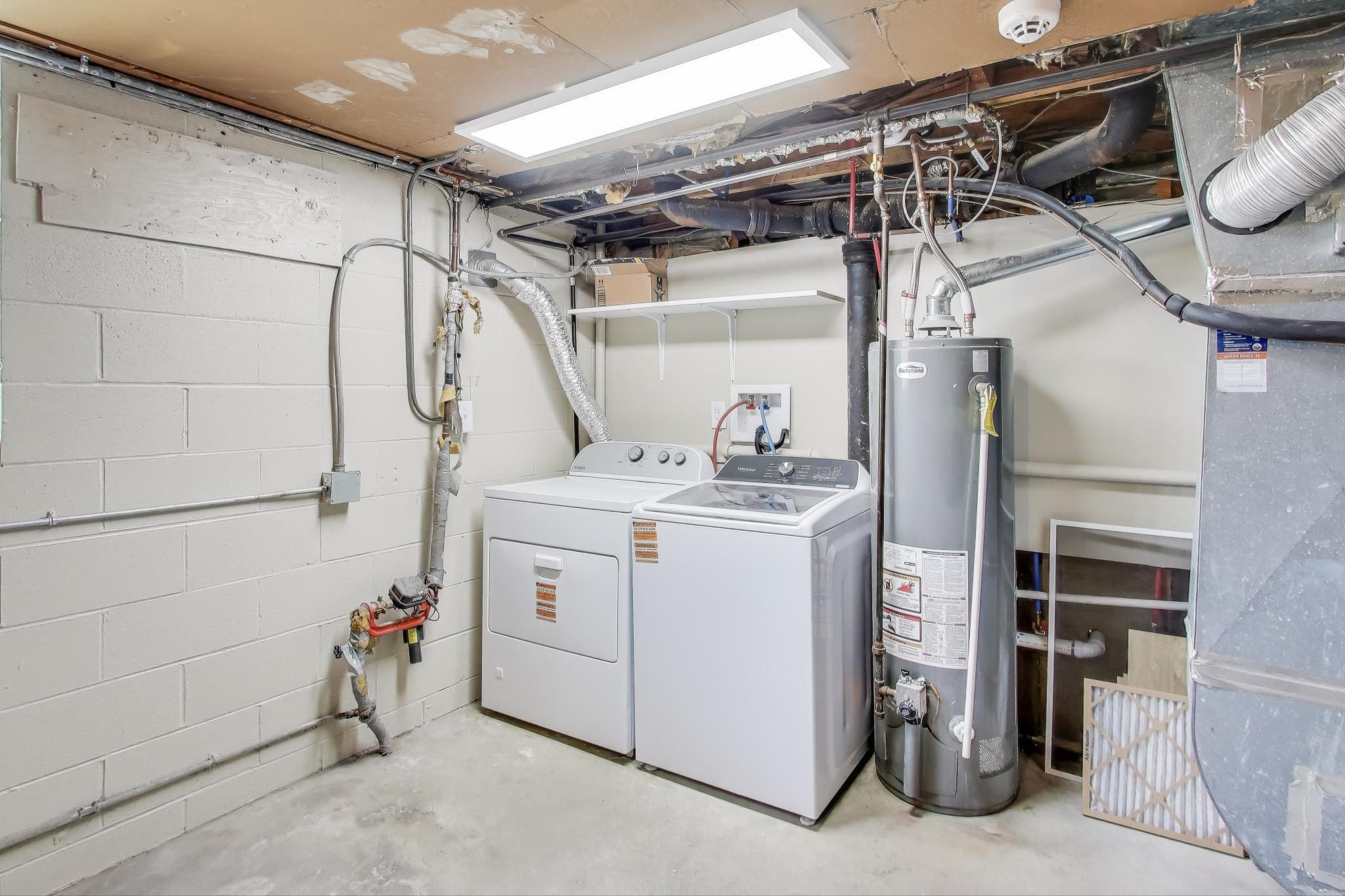 1124 Clinton Street Gary, IN 46406 - Photo 41 of 52 a utility room with dryer and washer