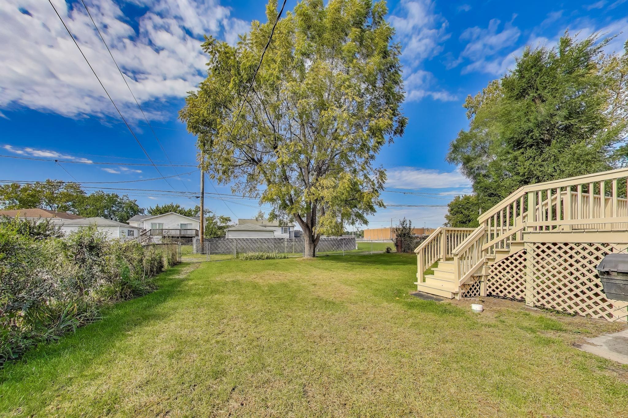 1124 Clinton Street Gary, IN 46406 - Photo 48 of 52 a view of a yard with swimming pool