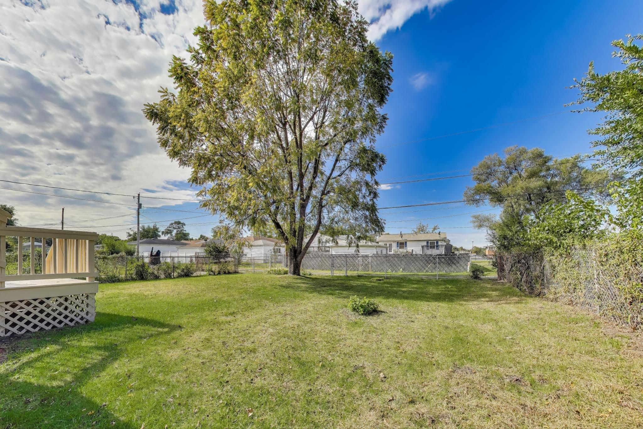 1124 Clinton Street Gary, IN 46406 - Photo 51 of 52 a view of yard with swimming pool and green space
