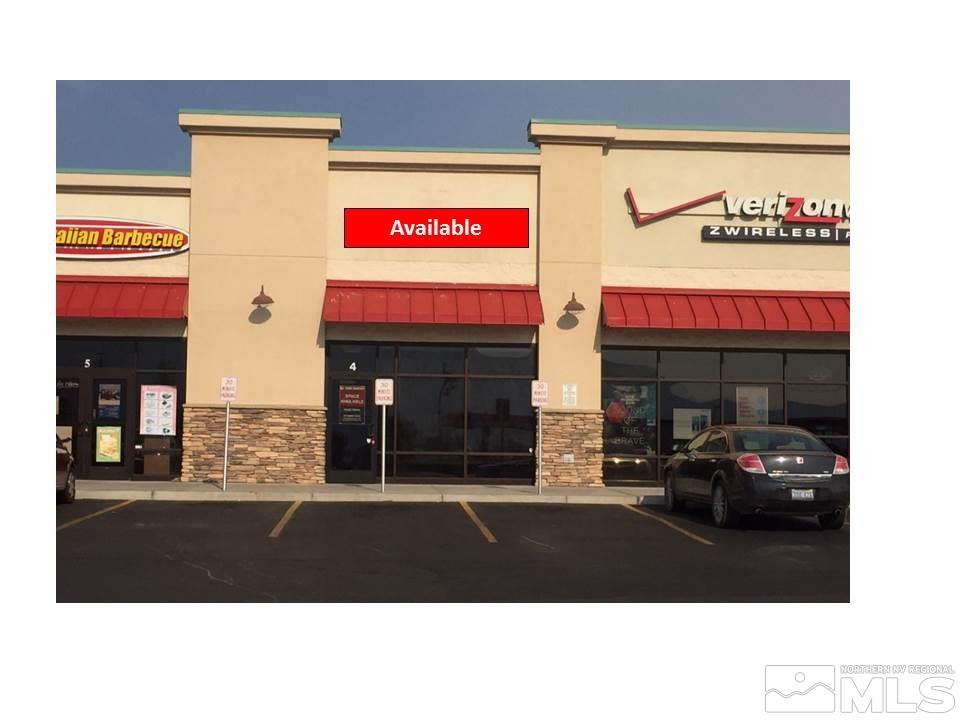 6 Pine Cone Road, Unit 4 Dayton, NV 89403 - Photo 1 of 1 a black and white photo of a building