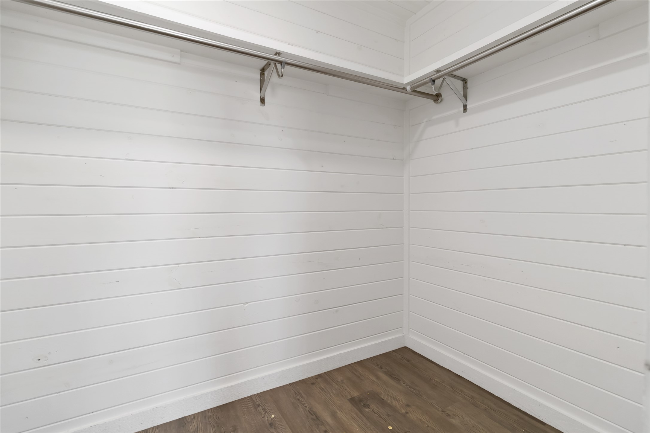 1525 Scull Road San Marcos, TX 78666 - Photo 18 of 25 Spacious closet featuring dark wood finished floors