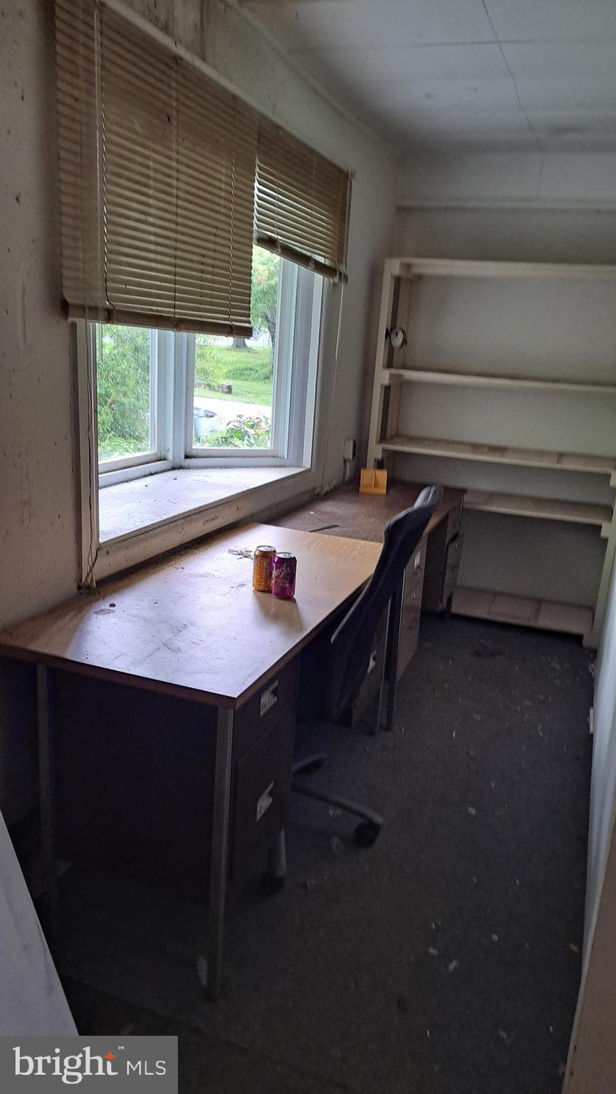 4401 East Joppa Road Perry Hall, MD 21236 - Photo 29 of 32 a room with a table chairs and a window