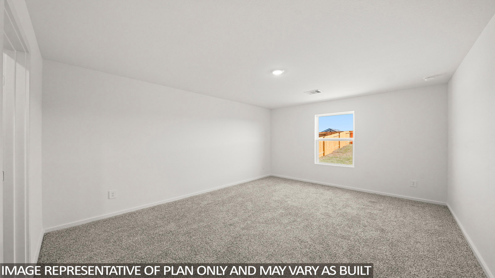 156 Baby Calf Roping Road Jarrell, TX 76537 - Photo 13 of 22 A spacious room offers comfortable carpet flooring and a view of the surrounding landscape.