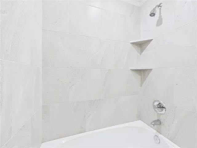 a bathroom with a bathtub