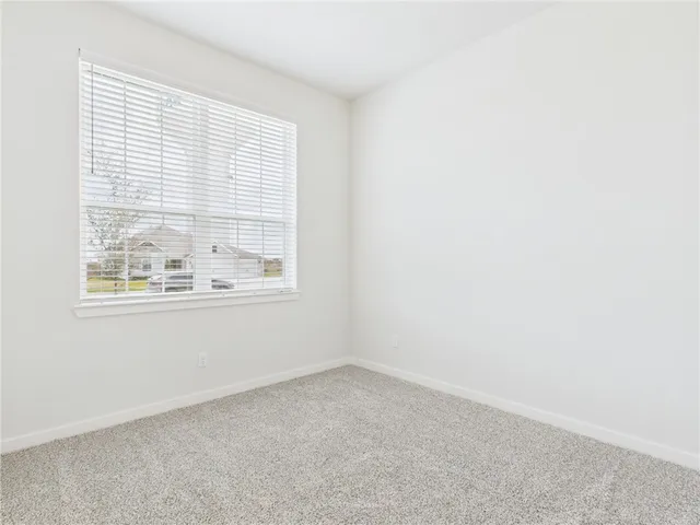 an empty room with closet