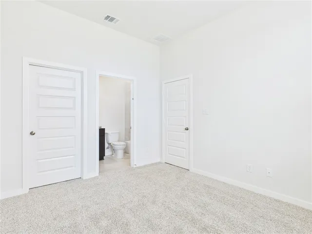 a view of small space with racks on the wall