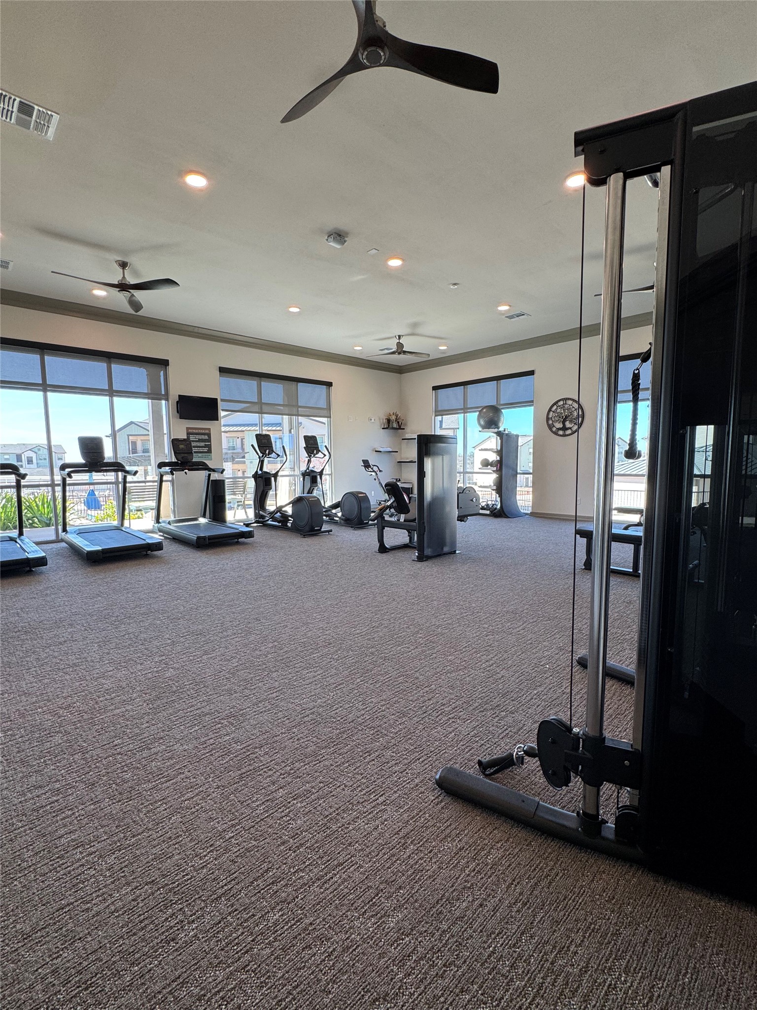691 Union Chapel Road, Unit A2 Cedar Creek, TX 78612 - Photo 19 of 21 a room with gym equipment and a large window