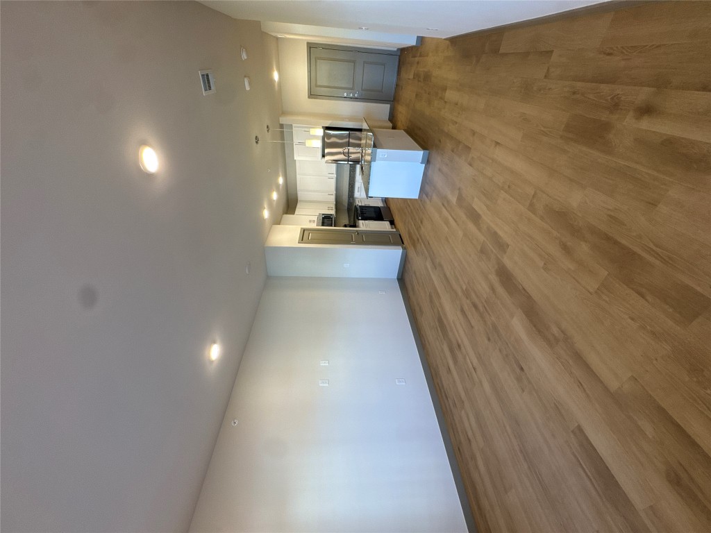 691 Union Chapel Road, Unit A2 Cedar Creek, TX 78612 - Photo 2 of 21 Living room featuring wood-style flooring and recessed lighting